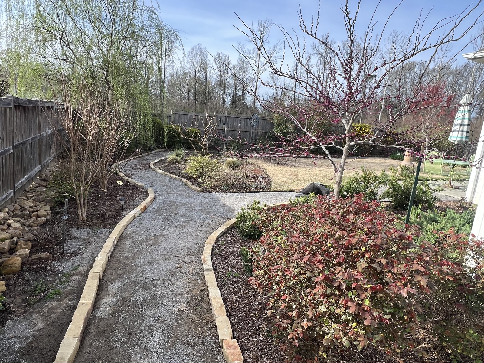 Five years later: mature landscape and chopped-stone borders