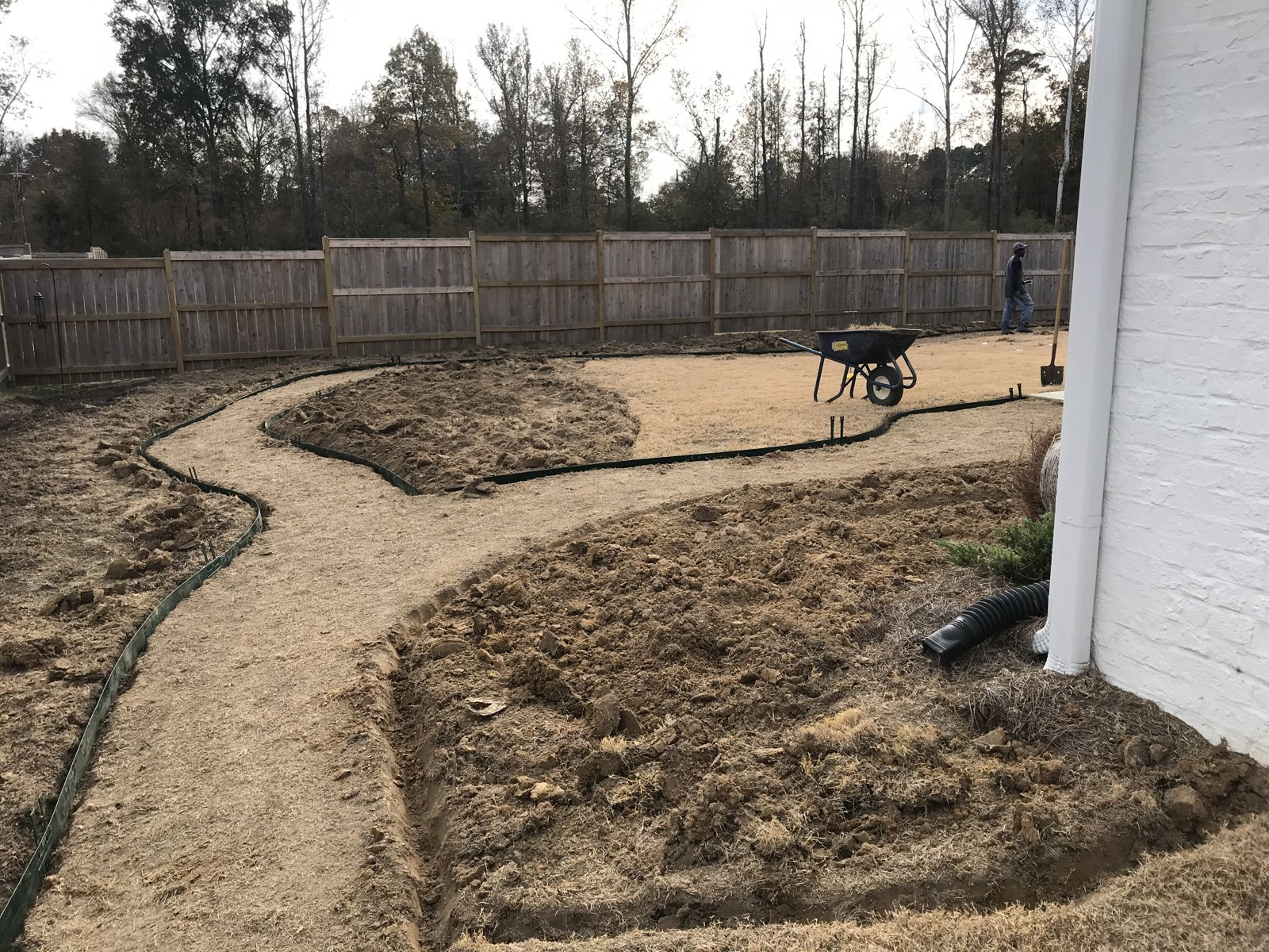 Progress: crushed-limestone walkway installation